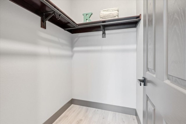 9150 Key W St, Port Charlotte, FL 33981 - spacious closet featuring wood finished floors
