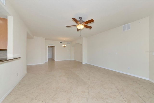318 Winding Brook Ln Unit 104, Bradenton, FL 34212 - unfurnished room with a ceiling fan, light tile patterned flooring, and arched walkways