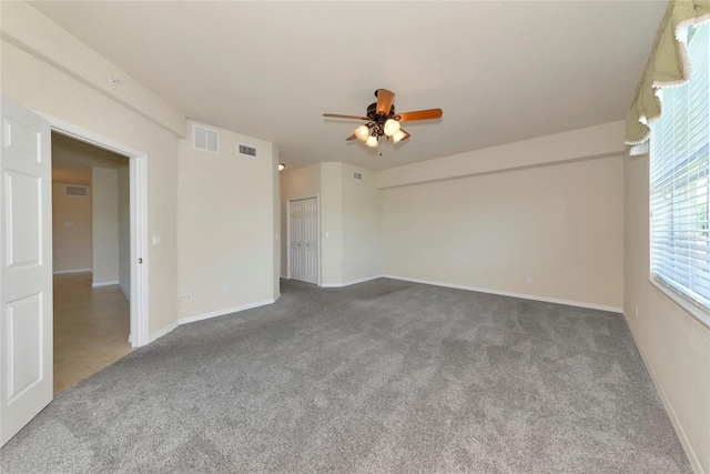 318 Winding Brook Ln Unit 104, Bradenton, FL 34212 - carpeted spare room featuring a ceiling fan and baseboards