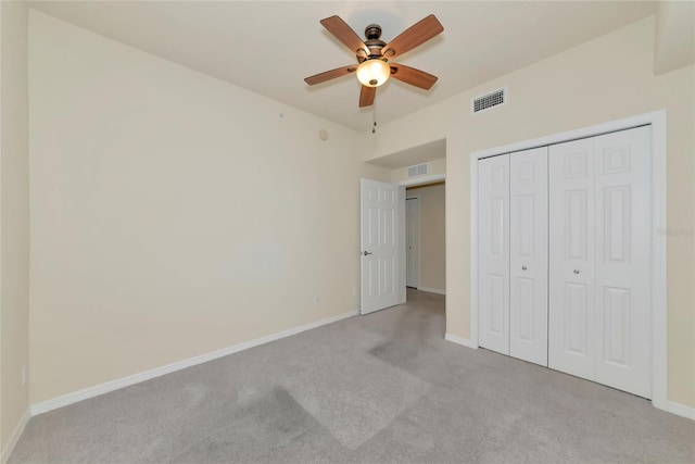 318 Winding Brook Ln Unit 104, Bradenton, FL 34212 - unfurnished bedroom with light carpet, a closet, and a ceiling fan