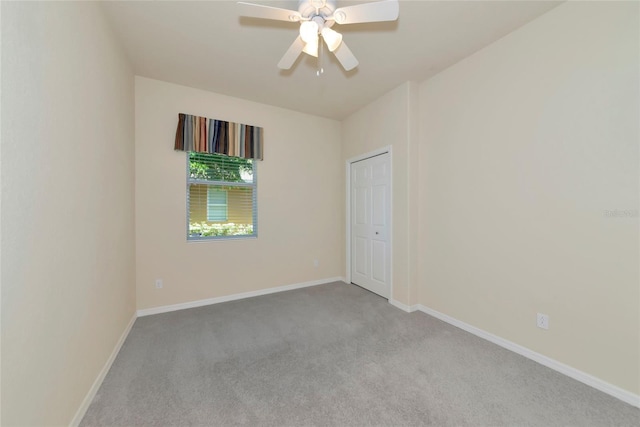 318 Winding Brook Ln Unit 104, Bradenton, FL 34212 - carpeted empty room featuring baseboards and ceiling fan