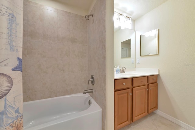 318 Winding Brook Ln Unit 104, Bradenton, FL 34212 - full bath with  shower combination, vanity, and tile patterned flooring