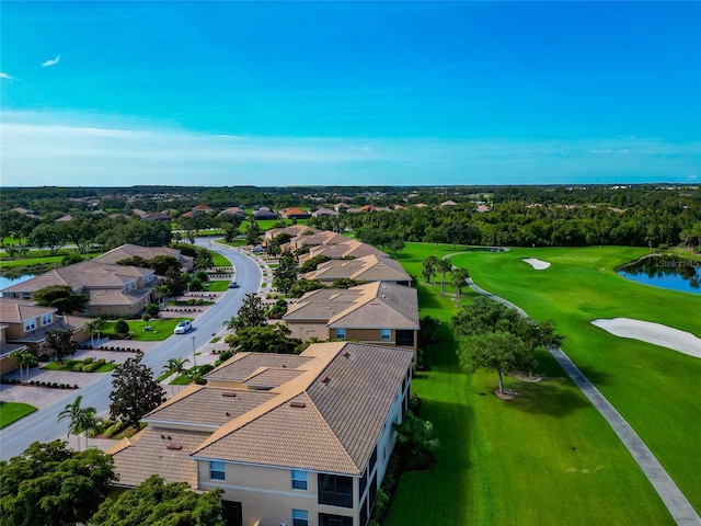 318 Winding Brook Ln Unit 104, Bradenton, FL 34212 - aerial perspective of suburban area featuring a nearby body of water and a golf club
