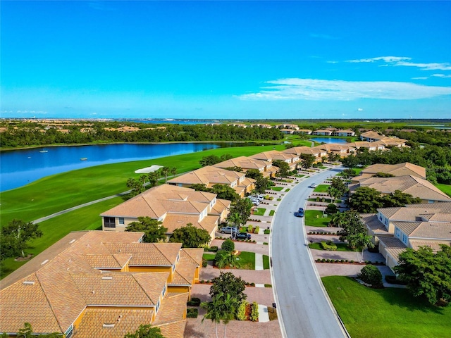318 Winding Brook Ln Unit 104, Bradenton, FL 34212 - aerial perspective of suburban area featuring a large body of water and a local golf course