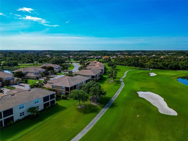 318 Winding Brook Ln Unit 104, Bradenton, FL 34212 - aerial perspective of suburban area featuring a local golf course and a nearby body of water