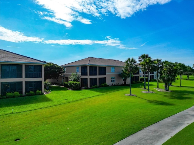 318 Winding Brook Ln Unit 104, Bradenton, FL 34212 - view of community with a lawn
