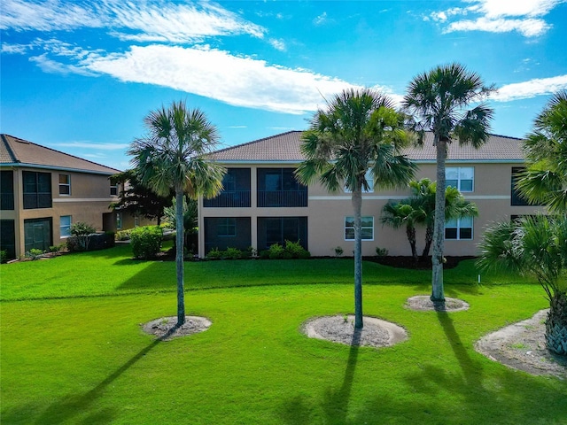 318 Winding Brook Ln Unit 104, Bradenton, FL 34212 - view of home's community featuring a yard