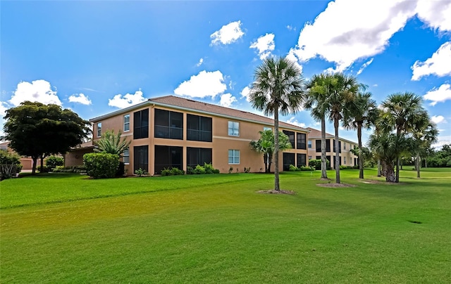 318 Winding Brook Ln Unit 104, Bradenton, FL 34212 - view of community with a yard