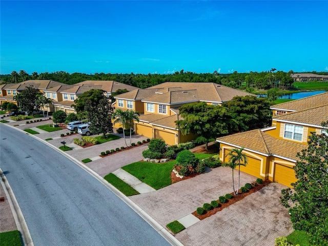 318 Winding Brook Ln Unit 104, Bradenton, FL 34212 - aerial perspective of suburban area featuring a large body of water