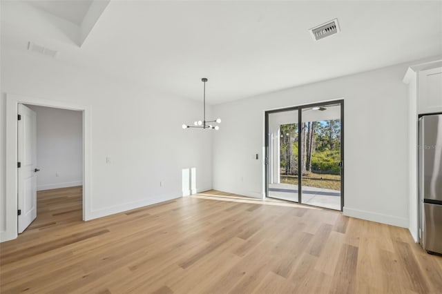 5386 Easter Ter, North Port, FL 34286 - unfurnished dining area featuring light wood finished floors and a chandelier