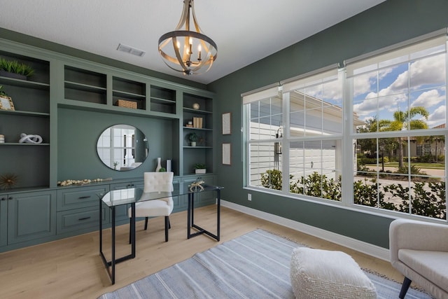 16511 Cornwall Ln, Lakewood Ranch, FL 34202 - office space featuring a chandelier and light wood finished floors