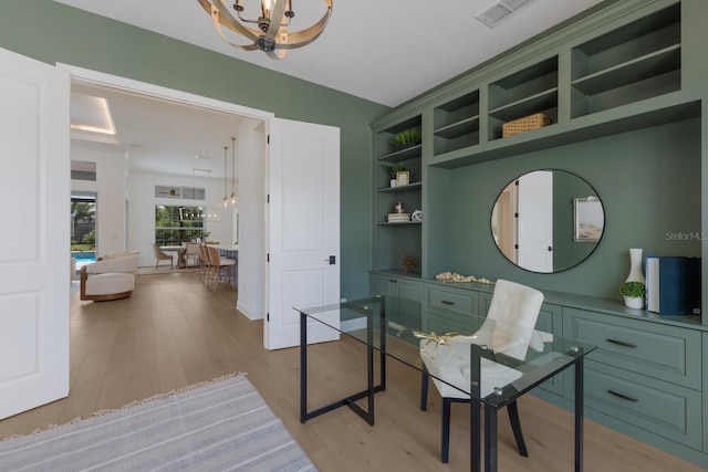 16511 Cornwall Ln, Lakewood Ranch, FL 34202 - office space with a chandelier and light wood-type flooring
