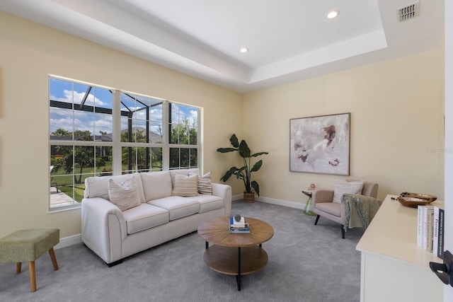16511 Cornwall Ln, Lakewood Ranch, FL 34202 - living room featuring carpet floors, healthy amount of natural light, recessed lighting, and a raised ceiling