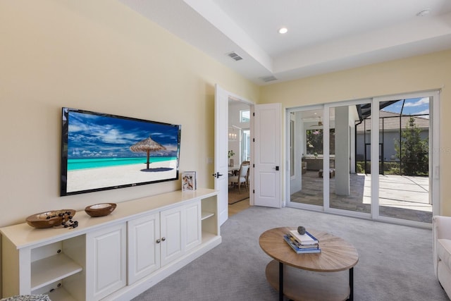 16511 Cornwall Ln, Lakewood Ranch, FL 34202 - living room with light colored carpet and recessed lighting