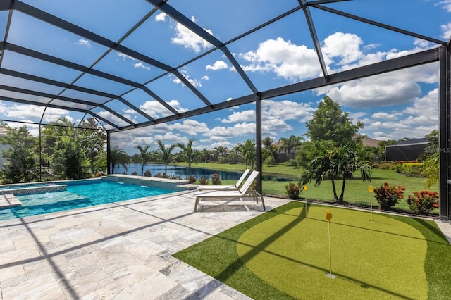 16511 Cornwall Ln, Lakewood Ranch, FL 34202 - swimming pool with a putting area, a patio area, an in-ground hot tub, a water view, and glass enclosure