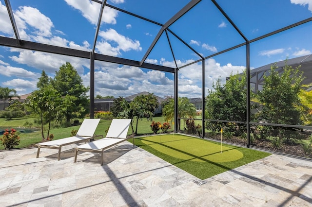 16511 Cornwall Ln, Lakewood Ranch, FL 34202 - view of patio with an area to practice putting and glass enclosure