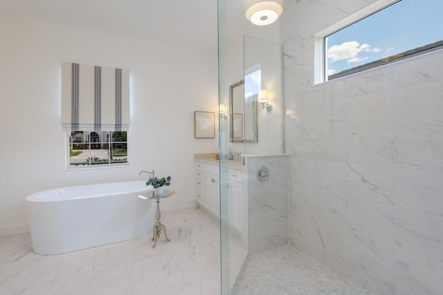 16511 Cornwall Ln, Lakewood Ranch, FL 34202 - bathroom with a soaking tub, vanity, a walk in shower, and marble look tile flooring
