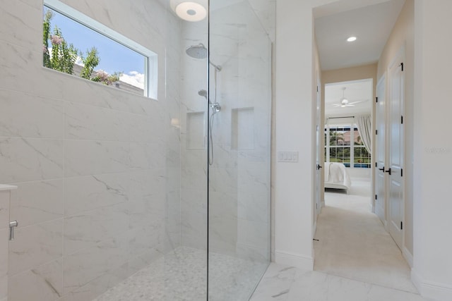 16511 Cornwall Ln, Lakewood Ranch, FL 34202 - ensuite bathroom with plenty of natural light, walk in shower, marble look tile flooring, and recessed lighting