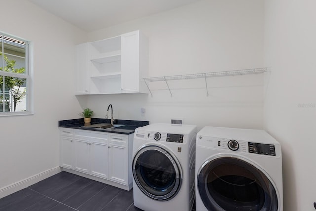 16511 Cornwall Ln, Lakewood Ranch, FL 34202 - laundry room with washing machine and dryer and cabinet space