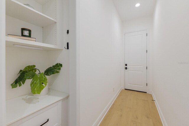 16511 Cornwall Ln, Lakewood Ranch, FL 34202 - corridor with light wood-type flooring and recessed lighting