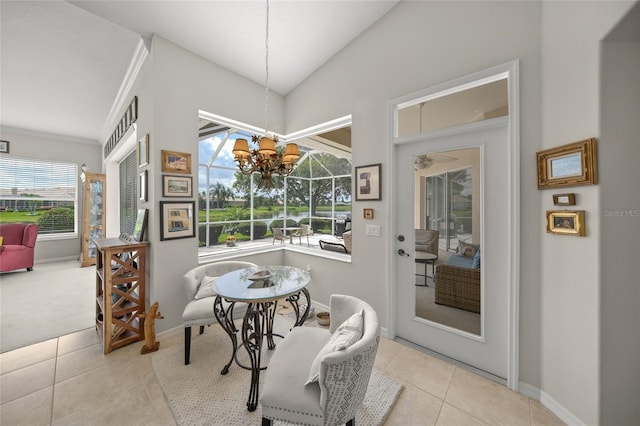 2937 Seasons Blvd, Sarasota, FL 34240 - dining room featuring plenty of natural light, tile patterned flooring, a chandelier, and lofted ceiling