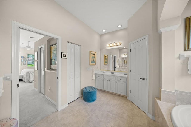 2937 Seasons Blvd, Sarasota, FL 34240 - full bath featuring ensuite bath, vanity, a garden tub, a closet, and tile patterned flooring