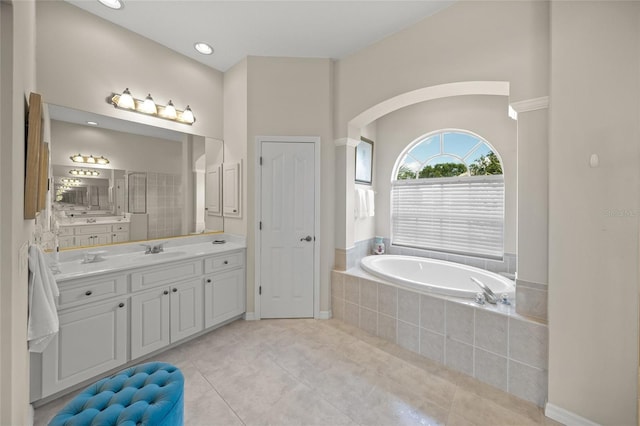 2937 Seasons Blvd, Sarasota, FL 34240 - bathroom with vanity, a garden tub, tile patterned flooring, and a stall shower