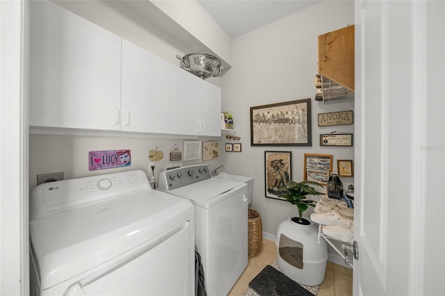 2937 Seasons Blvd, Sarasota, FL 34240 - washroom with cabinet space, independent washer and dryer, and light tile patterned floors