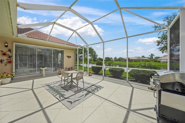2937 Seasons Blvd, Sarasota, FL 34240 - sunroom / solarium with outdoor dining area and a water view