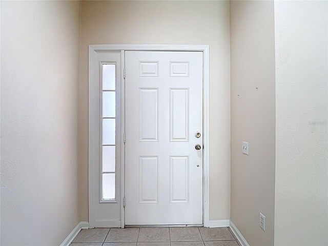 26548 Castleview Way, Wesley Chapel, FL 33544 - entrance foyer with light tile patterned flooring and baseboards