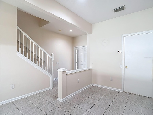 26548 Castleview Way, Wesley Chapel, FL 33544 - entryway with light tile patterned floors, stairway, and recessed lighting