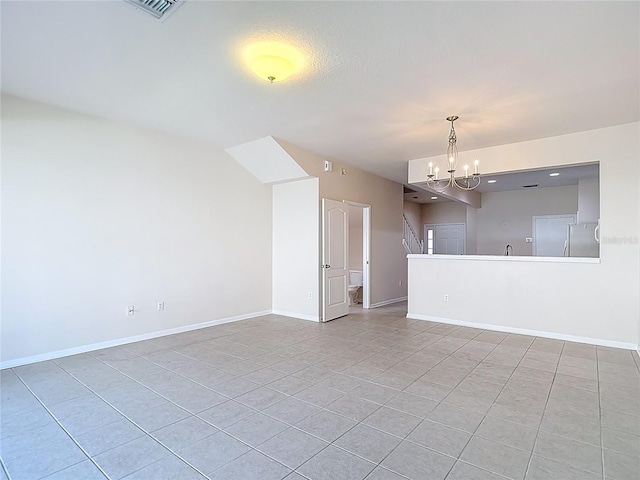 26548 Castleview Way, Wesley Chapel, FL 33544 - unfurnished living room with light tile patterned flooring and a chandelier