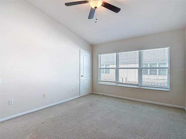 26548 Castleview Way, Wesley Chapel, FL 33544 - spare room with a ceiling fan, vaulted ceiling, and light carpet