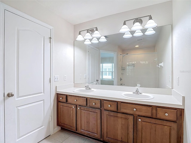 26548 Castleview Way, Wesley Chapel, FL 33544 - full bath with a tile shower, double vanity, and tile patterned floors