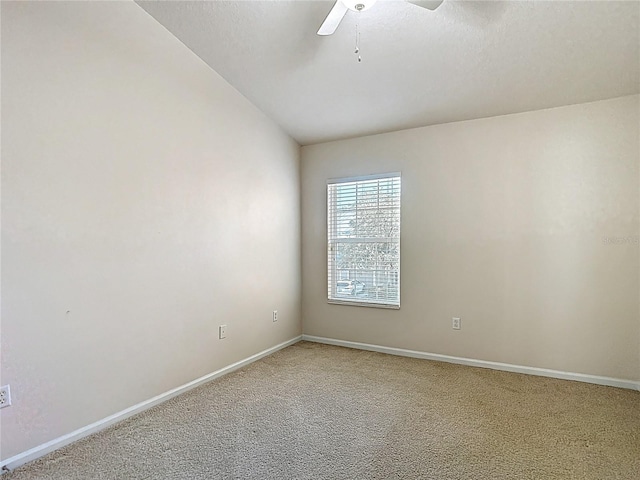 26548 Castleview Way, Wesley Chapel, FL 33544 - unfurnished room with a ceiling fan, vaulted ceiling, and light colored carpet