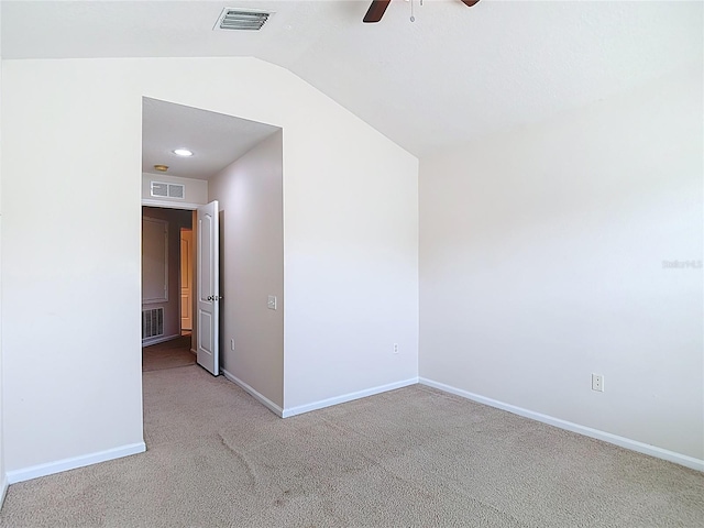26548 Castleview Way, Wesley Chapel, FL 33544 - carpeted spare room with a ceiling fan and lofted ceiling