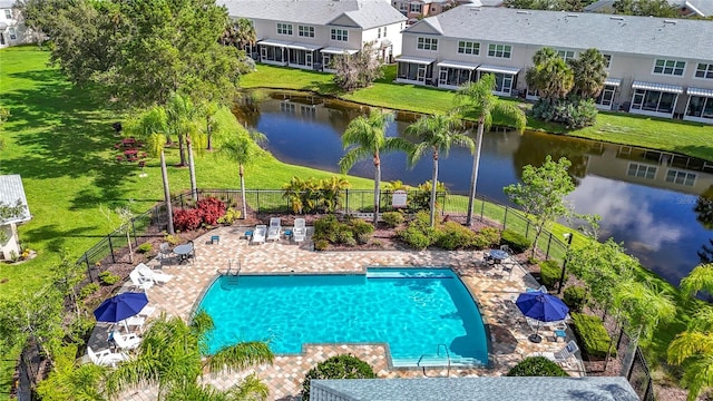 26548 Castleview Way, Wesley Chapel, FL 33544 - community pool with a water view, a residential view, and a patio