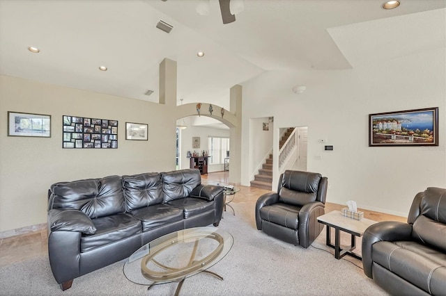 815 Greenview Dr, Apollo Beach, FL 33572 - living room featuring arched walkways, stairs, ceiling fan, recessed lighting, and vaulted ceiling