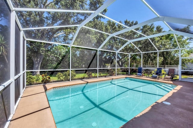 815 Greenview Dr, Apollo Beach, FL 33572 - view of swimming pool featuring glass enclosure and a patio