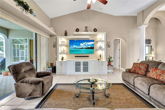 2801 SW 29th Ct, Cape Coral, FL 33914 - living room with arched walkways, light tile patterned floors, a ceiling fan, vaulted ceiling, and ornate columns