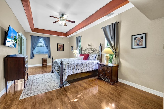 2801 SW 29th Ct, Cape Coral, FL 33914 - bedroom with wood finished floors, a raised ceiling, and ceiling fan