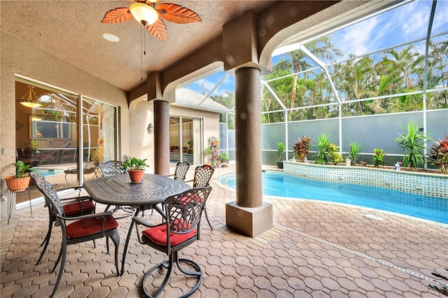 2801 SW 29th Ct, Cape Coral, FL 33914 - view of patio / terrace with glass enclosure and ceiling fan