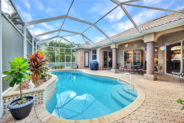 2801 SW 29th Ct, Cape Coral, FL 33914 - outdoor pool featuring a patio area, a ceiling fan, outdoor dining area, and area for grilling