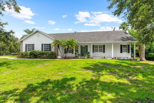 21705 67th Ave E, Bradenton, FL 34211 - ranch-style home featuring a front lawn, stucco siding, and a shingled roof