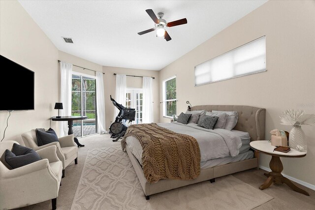 21705 67th Ave E, Bradenton, FL 34211 - bedroom featuring light colored carpet, access to exterior, and ceiling fan