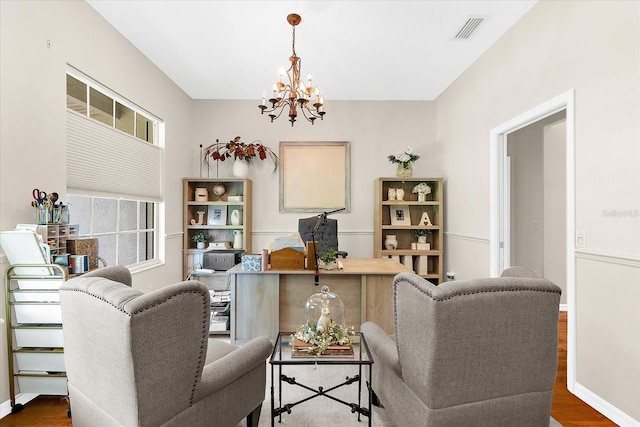 21705 67th Ave E, Bradenton, FL 34211 - living room featuring a chandelier and wood finished floors