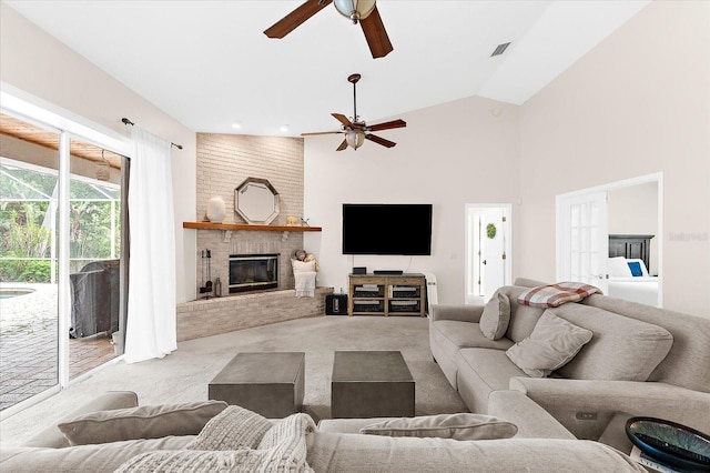 21705 67th Ave E, Bradenton, FL 34211 - carpeted living room with ceiling fan, a brick fireplace, and vaulted ceiling