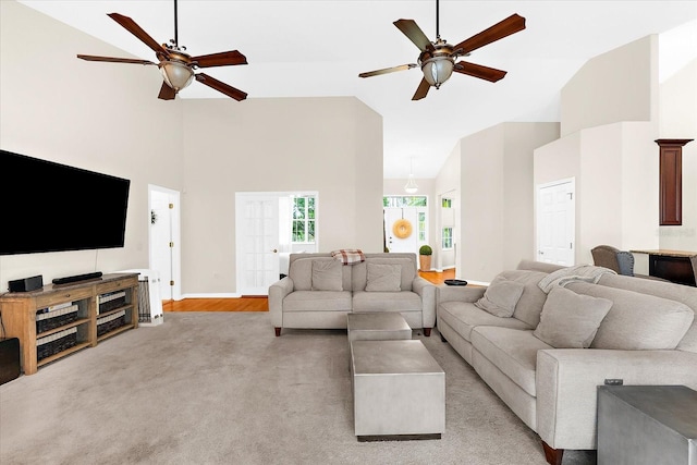 21705 67th Ave E, Bradenton, FL 34211 - living area with a ceiling fan, high vaulted ceiling, and light colored carpet