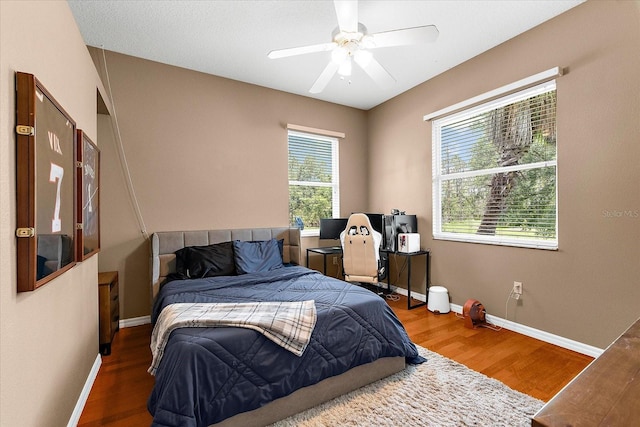 21705 67th Ave E, Bradenton, FL 34211 - bedroom featuring wood finished floors and a ceiling fan