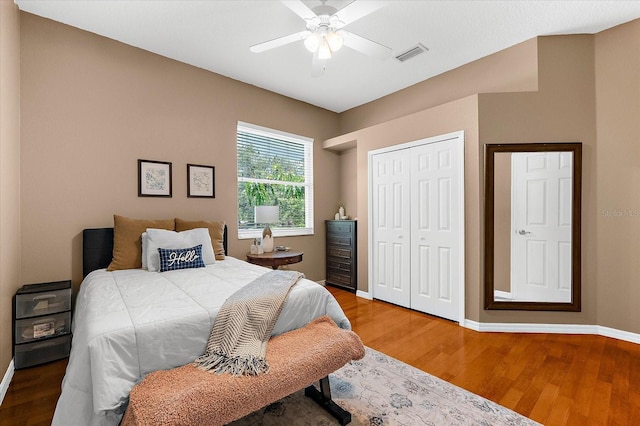 21705 67th Ave E, Bradenton, FL 34211 - bedroom featuring wood finished floors, a closet, and a ceiling fan